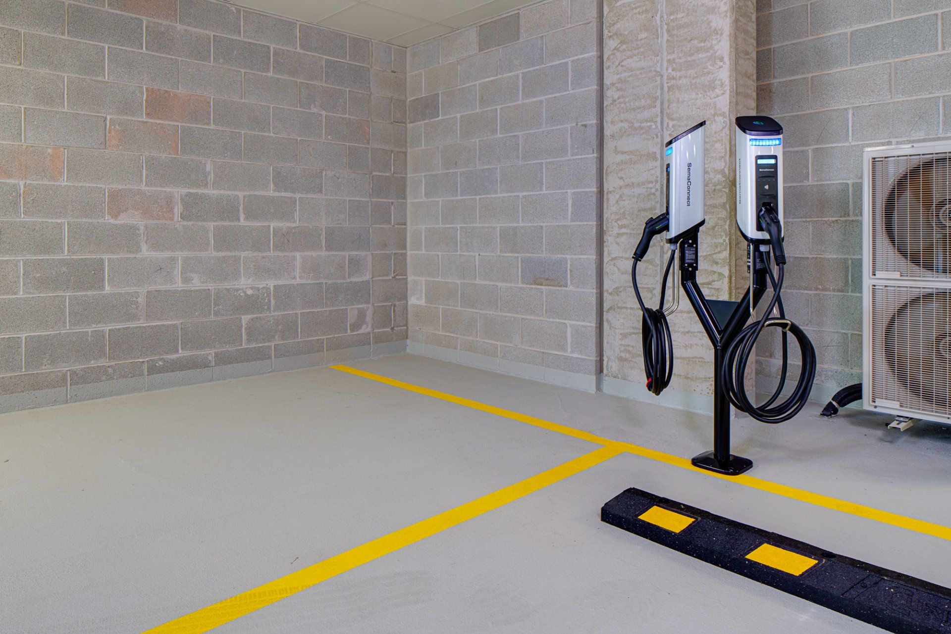 Apartment community with electric car charging station in Chicago.