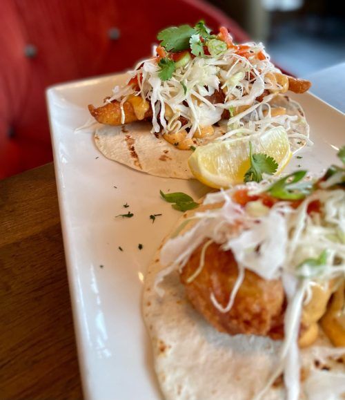 A close up of a plate of food on a table.