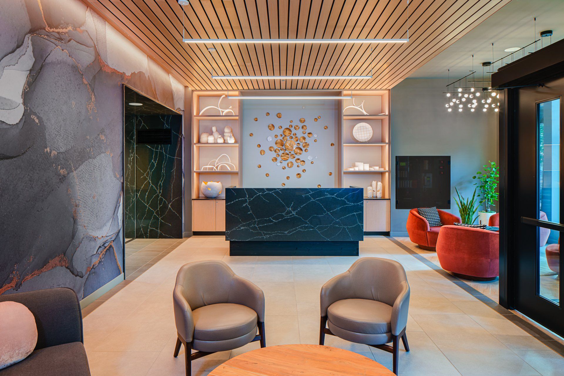 Apartment entrance with front desk at Gild Apartment.