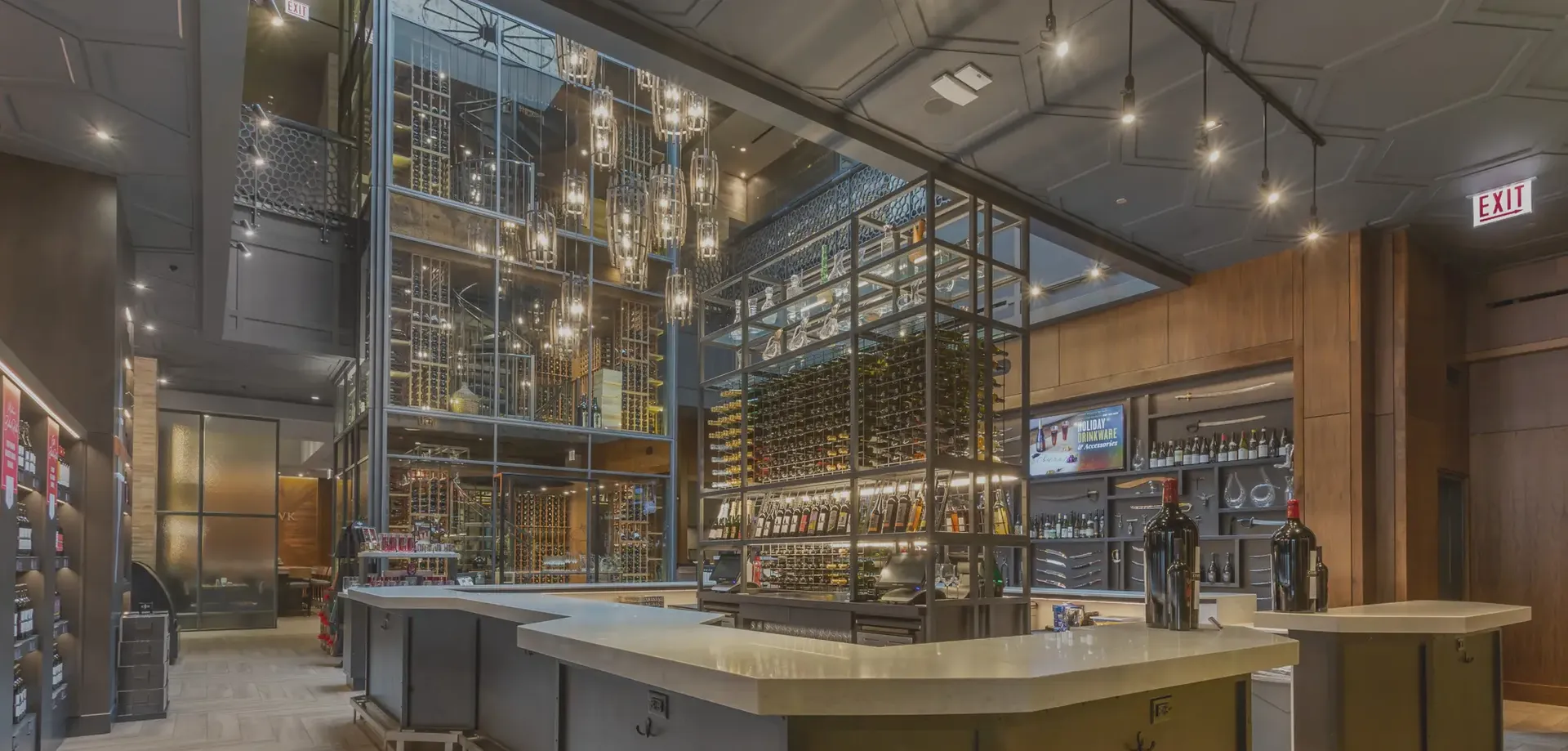 A large room with a bar in the middle of it.