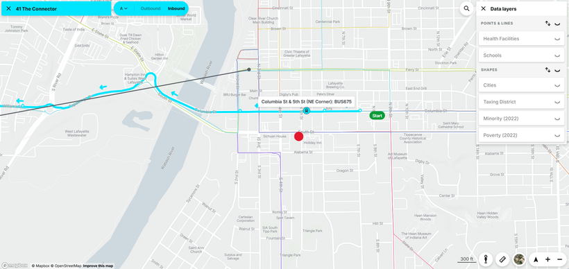 Map showing a route and a destination marked by a red pin, with menu options on the right side.