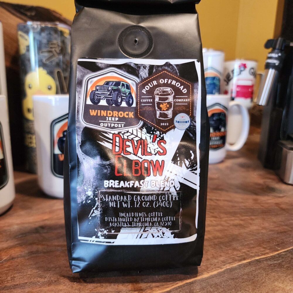 Black bag of Windrock Devil’s Blend breakfast coffee on a wooden counter