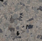 A close up of a marble floor with a lot of small stones on it.