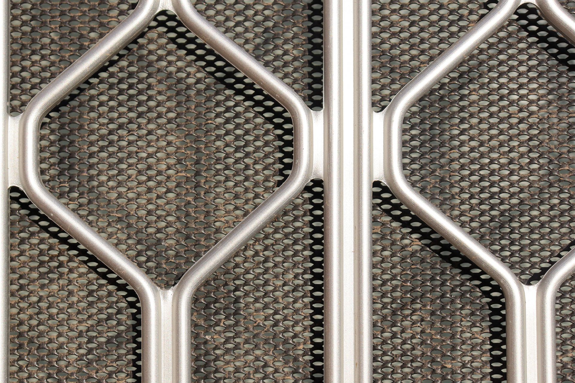 Close-up of a security screen door.