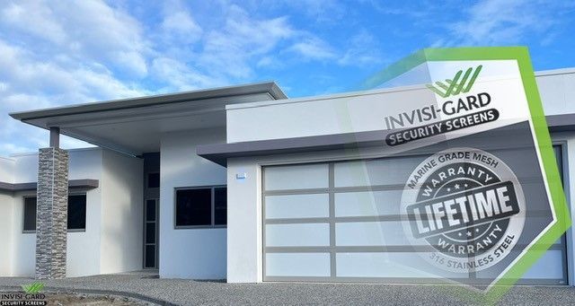 Modern white house with a garage featuring security screen
