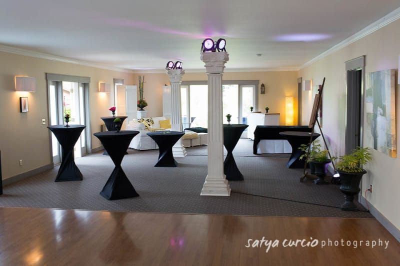 A photo of a room with tables and columns taken by sallya cortez photography