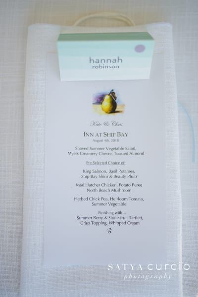 A menu with a place card that says hannah on it