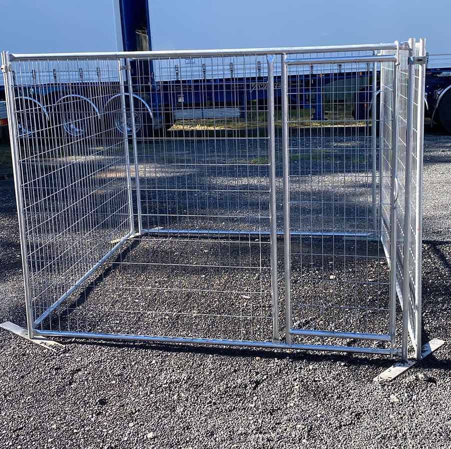 A Metal Fence Is Sitting On Top Of A Gravel Road — Coffs Temporary Fencing Pty Ltd In Sawtell, NSW
