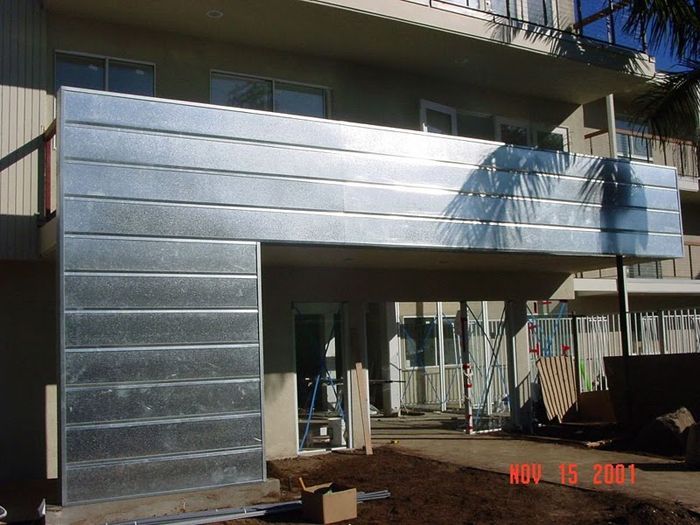 worker installing a gutter