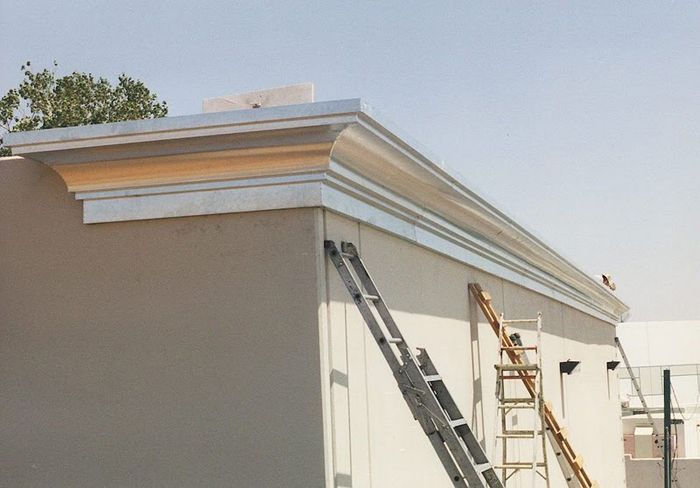 worker installing a gutter