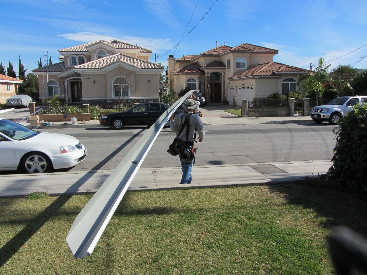 worker installing a gutter