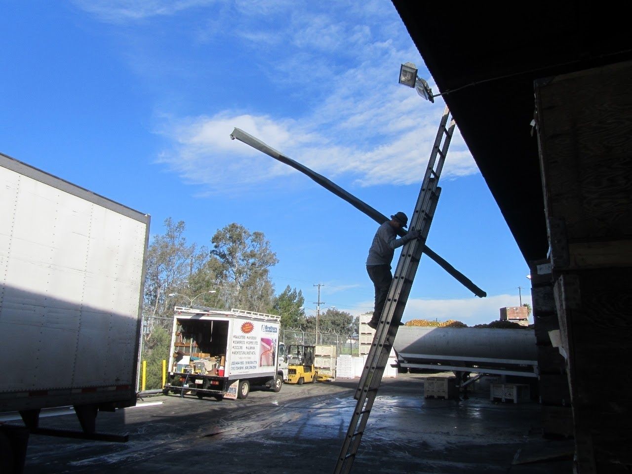worker installing a gutter