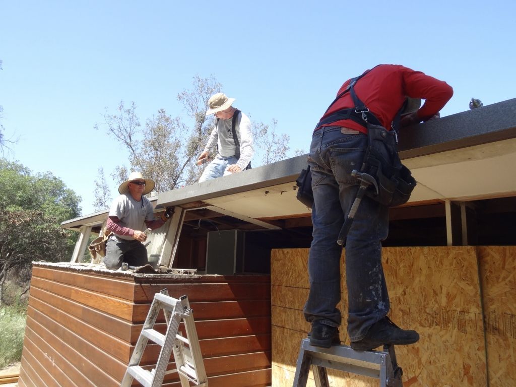 worker installing a gutter