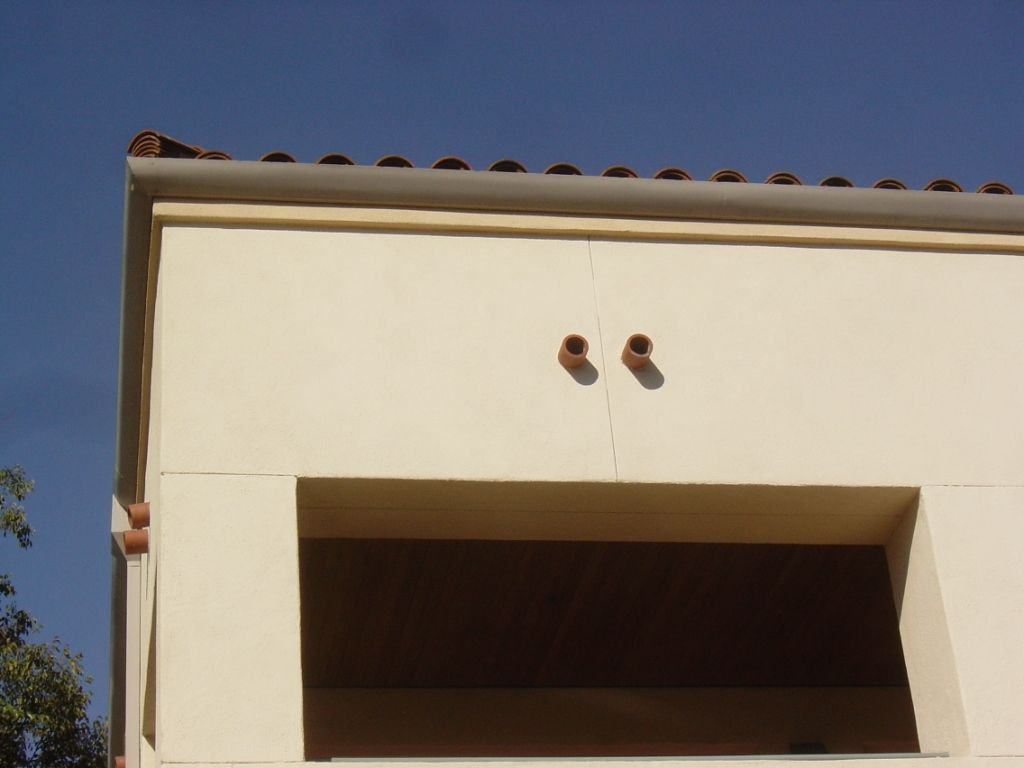 worker installing a gutter