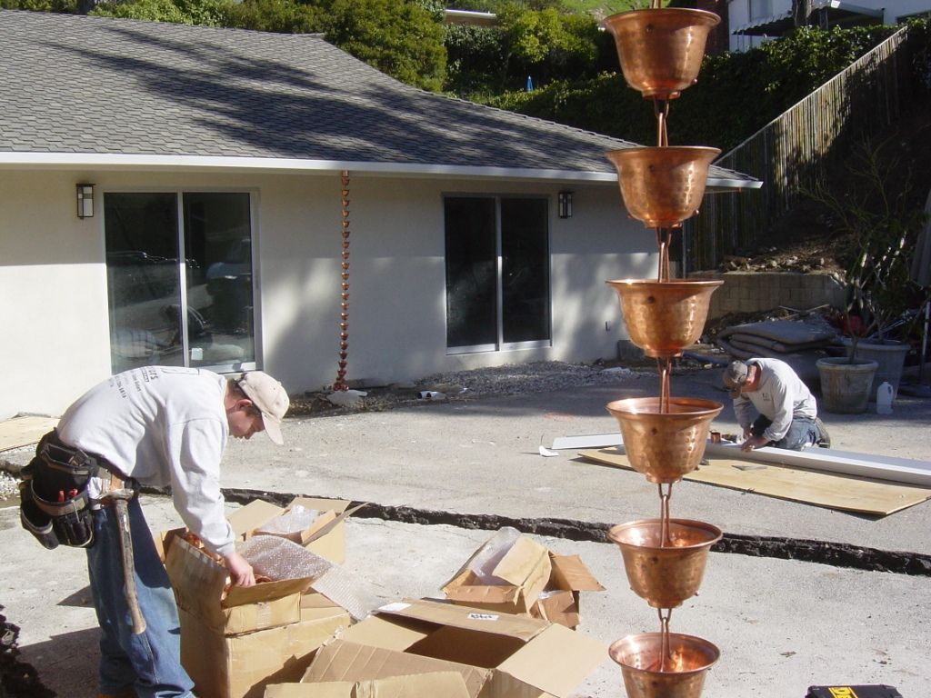 worker installing a gutter