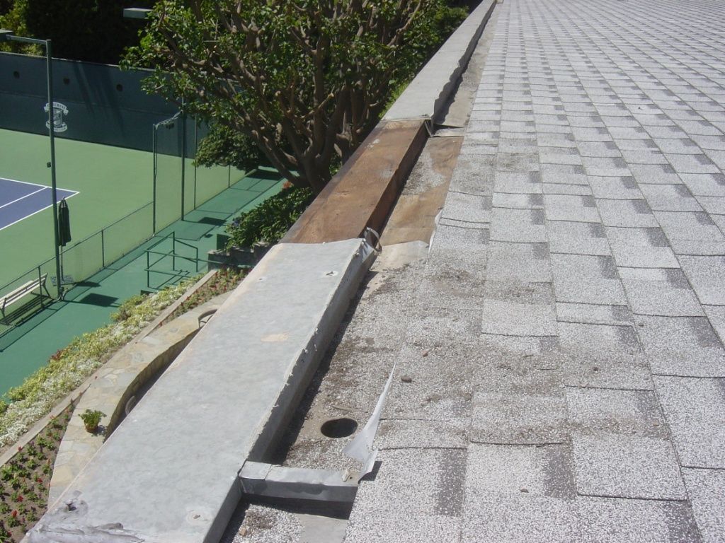 worker installing a gutter