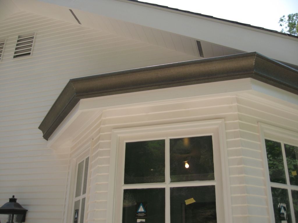 worker installing a gutter