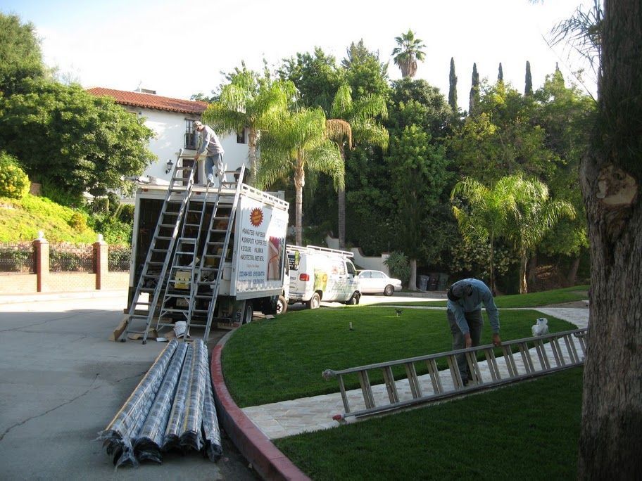 worker installing a gutter