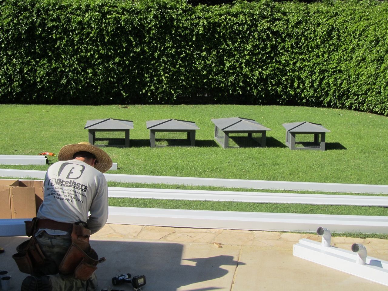 worker installing a gutter