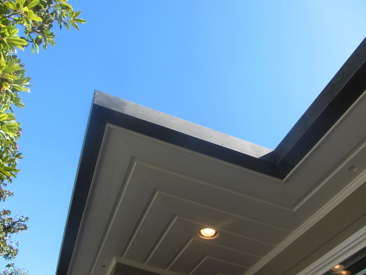 worker installing a gutter