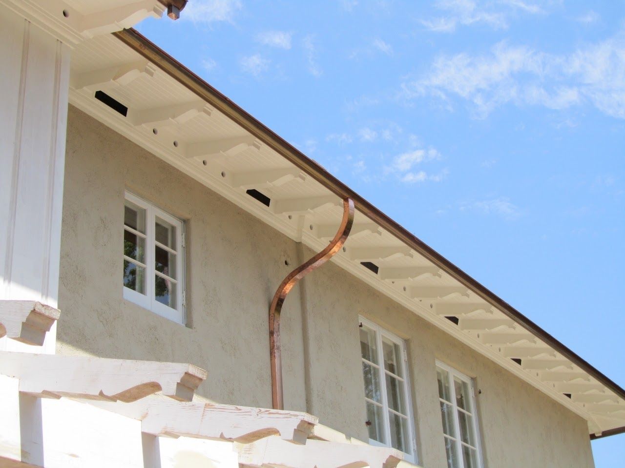 worker installing a gutter