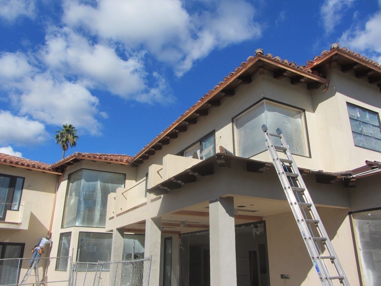 worker installing a gutter