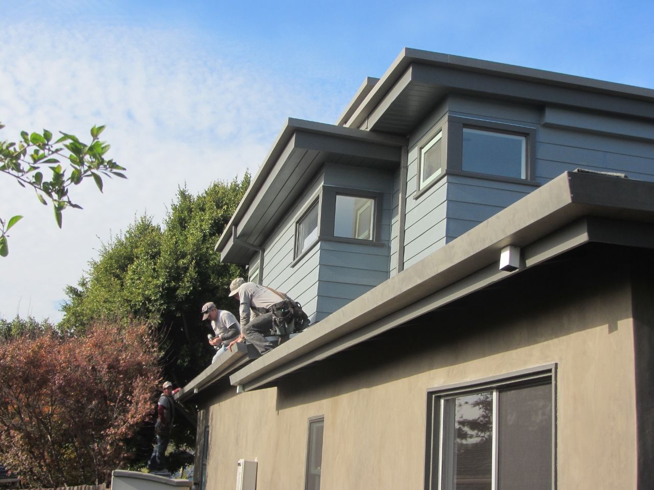 worker installing a gutter