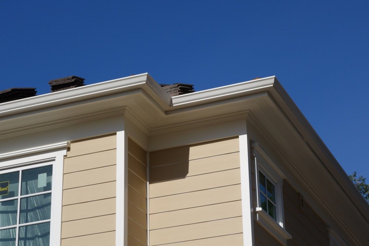 worker installing a gutter