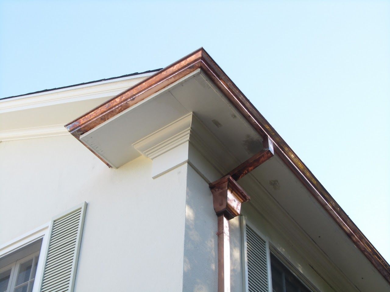 worker installing a gutter