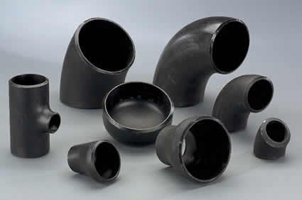 There are many different types of pipe fittings on the table.