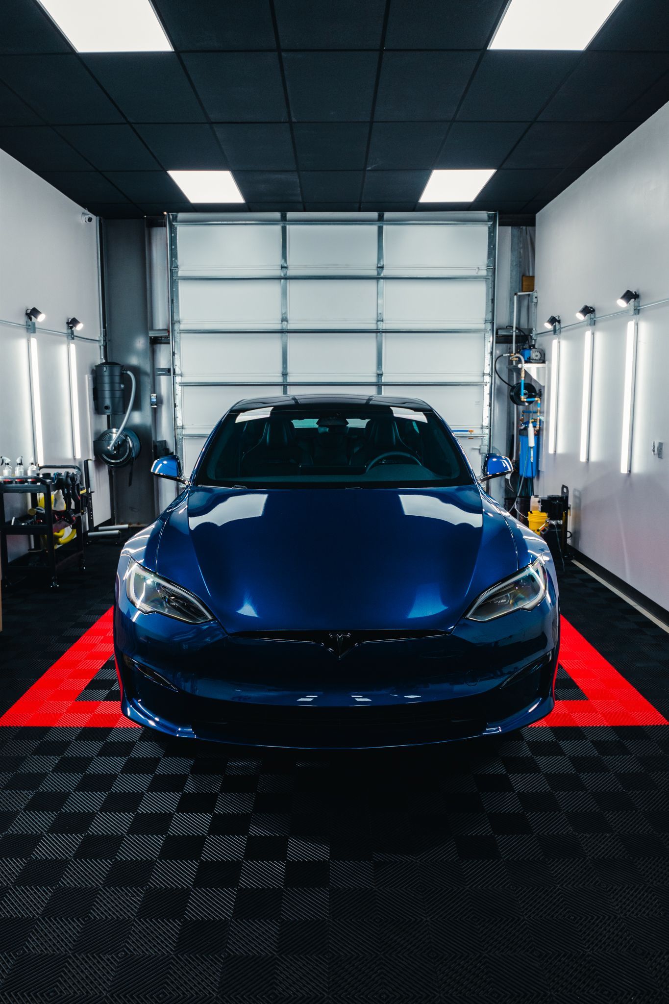 Close-up of Tesla protection tinted glass roof using SolarFX Window Tint in Lake Norman.