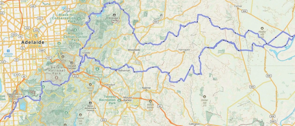 Road map showing highways, rivers, and city labels across a mountainous region, with blue route lines.