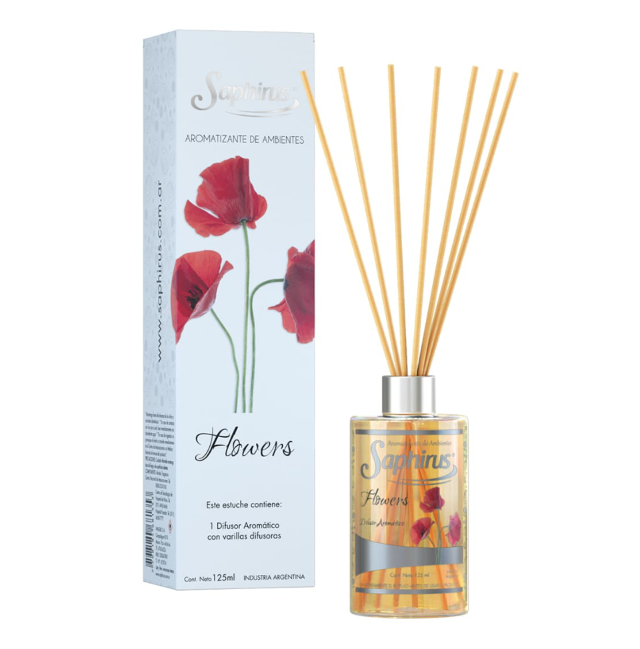 Set difusor de varillas con caja de diseño floral y botella de vidrio con varillas doradas.