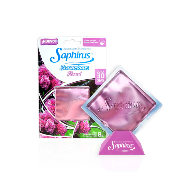 Envase del ambientador de cristal rosa Saphirus con aroma a flores y fondo floral.