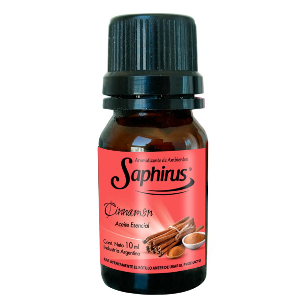 Frasco pequeño de color marrón con tapa negra, etiquetado como aceite esencial de canela Saphirus sobre fondo blanco.