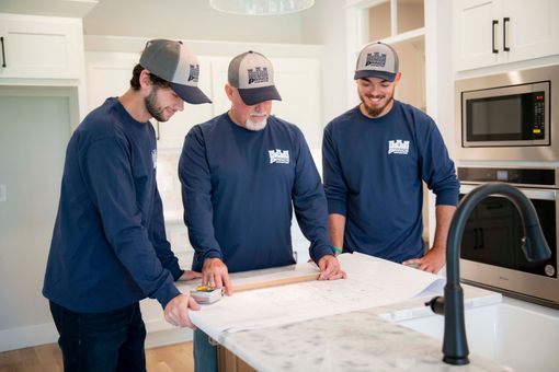 Prince Properties Homes - People Reviewing Building Plans
