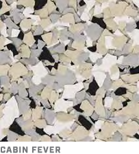 Close-up of white, gray, and black pebbles with the words “CABIN FEVER” at the bottom.