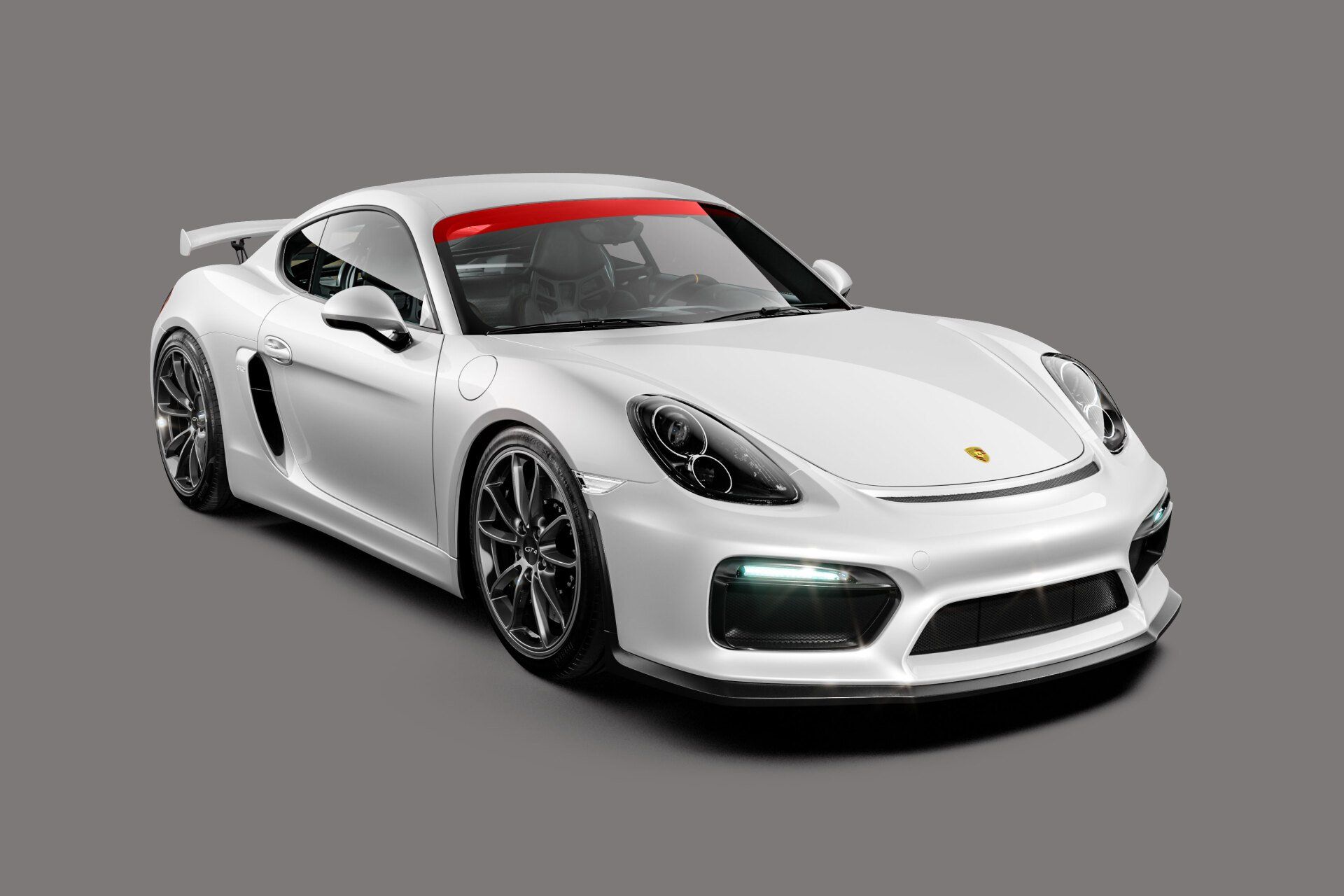 White Porsche sports car with red visor on gray background.
