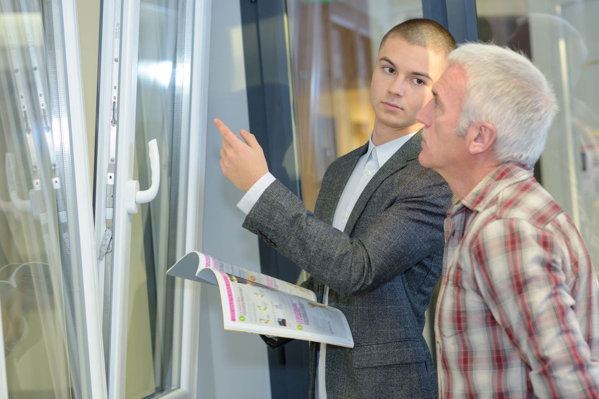 UPVC installer speaking with homeowners