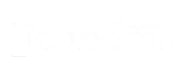 Mostly blank white screen with a faint gray line and tiny mark in the lower left corner