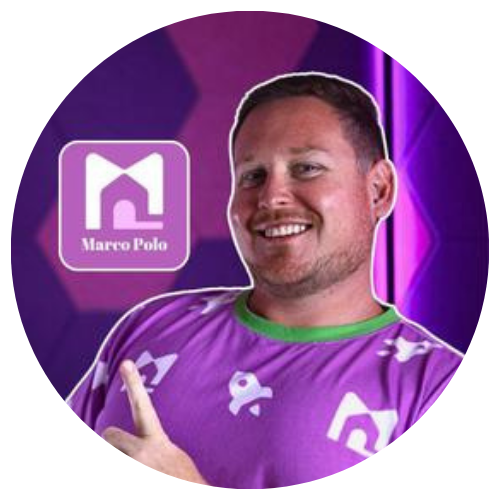 Smiling man in purple shirt pointing at a Marcos Polo logo on a purple background