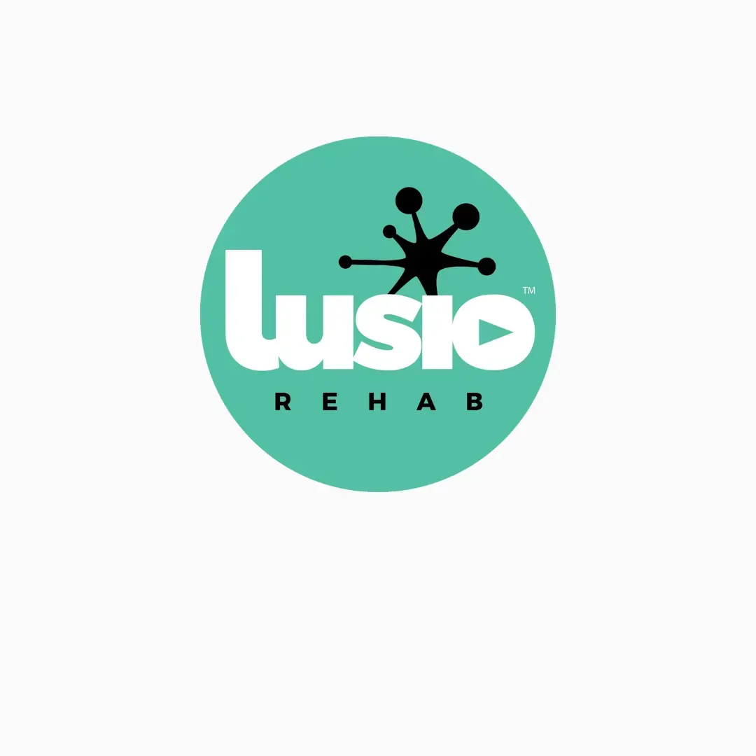 Lusio Rehab logo in white on a teal circle with a black human figure above the text