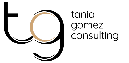 Tania Gomez Consulting logo with stylized black and gold “tg” and company name text