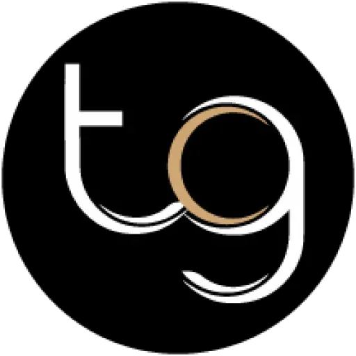 White “tg” letters with tan and white accents on a black circular logo.