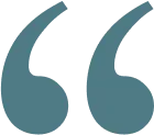 Stylized teal quotation marks icon on a white background