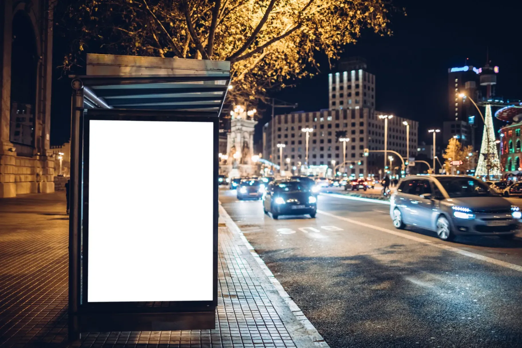 a blank outdoor signage along a busy street