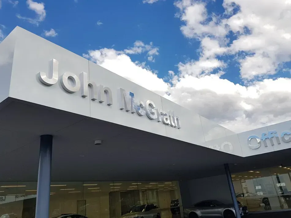John McGrath signage