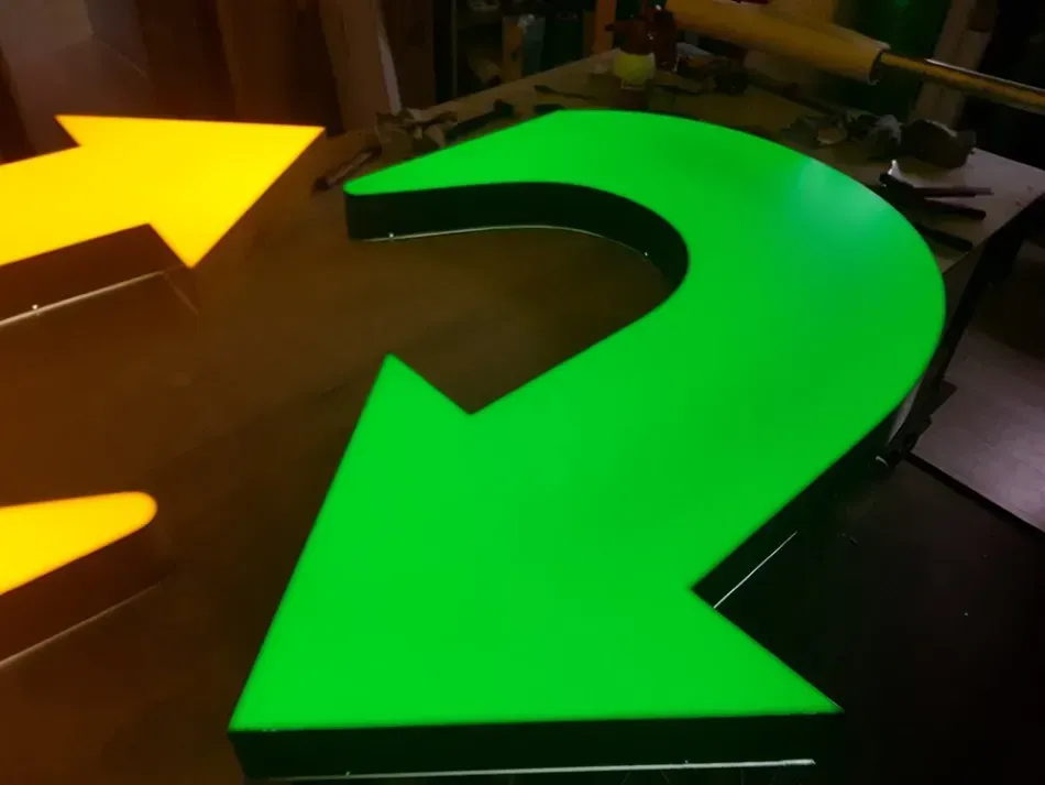 A green arrow with a yellow arrow behind it