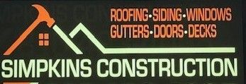 A sign that says simpkins construction on it