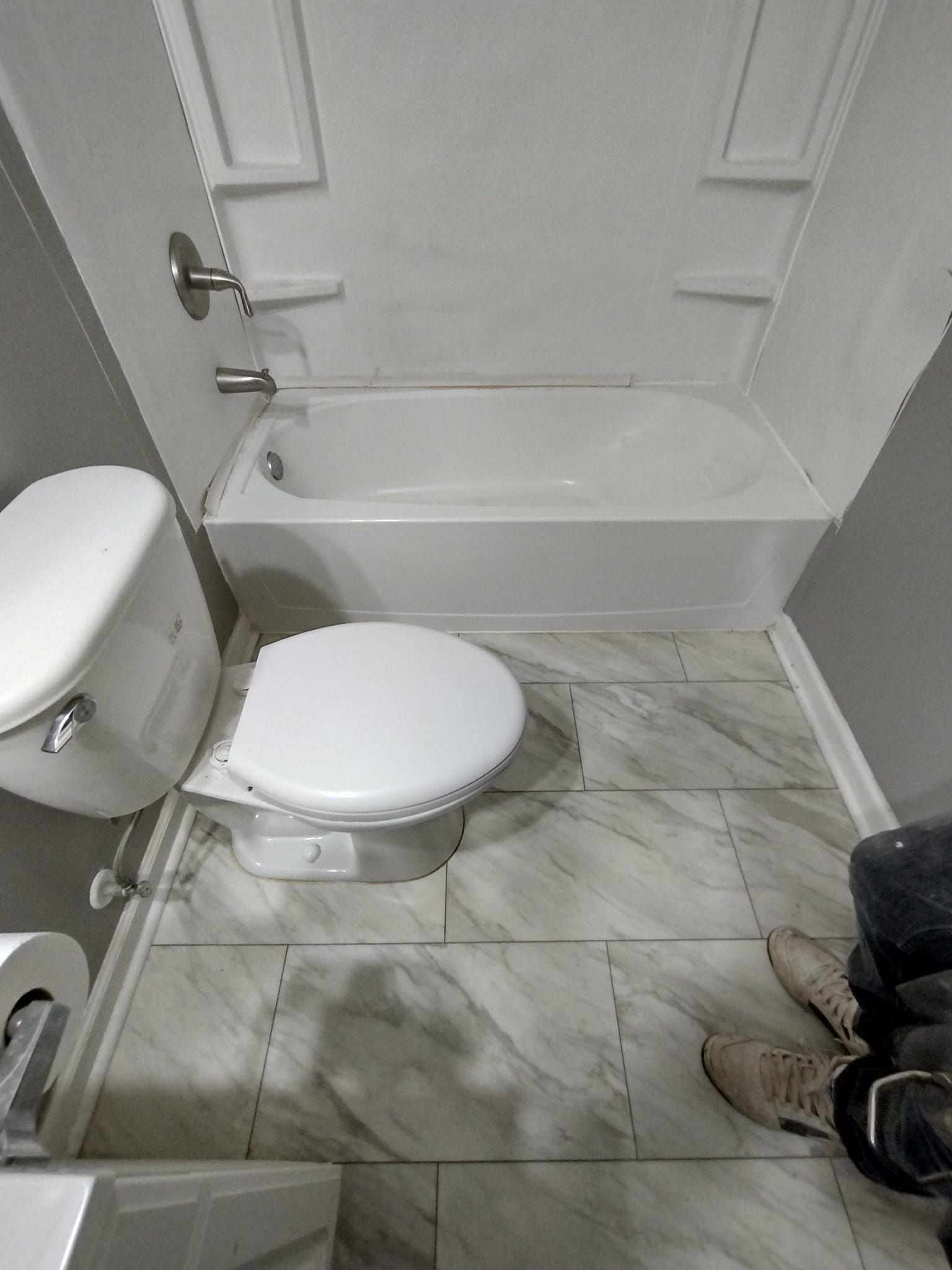 You can see a bathtub and shower that was recently renovated here in Winchester, Virginia. 